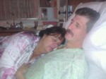 Frank and Susan taking a nap in the hospital