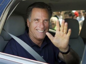 Romney wave from car